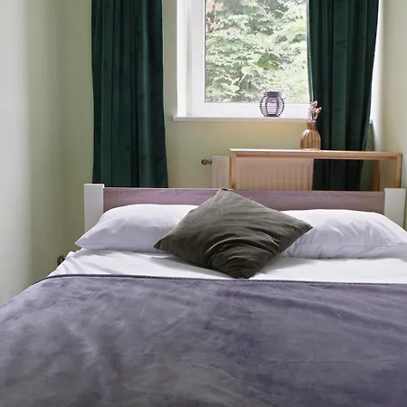 - Krakhouse Apartmanhotel